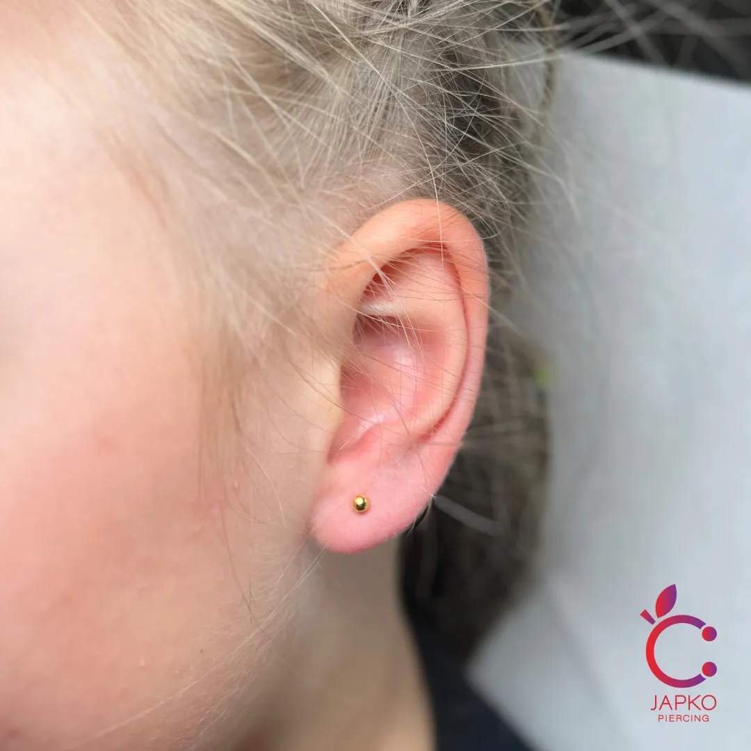 Realizacja przekłucia, studio Japko Piercing
